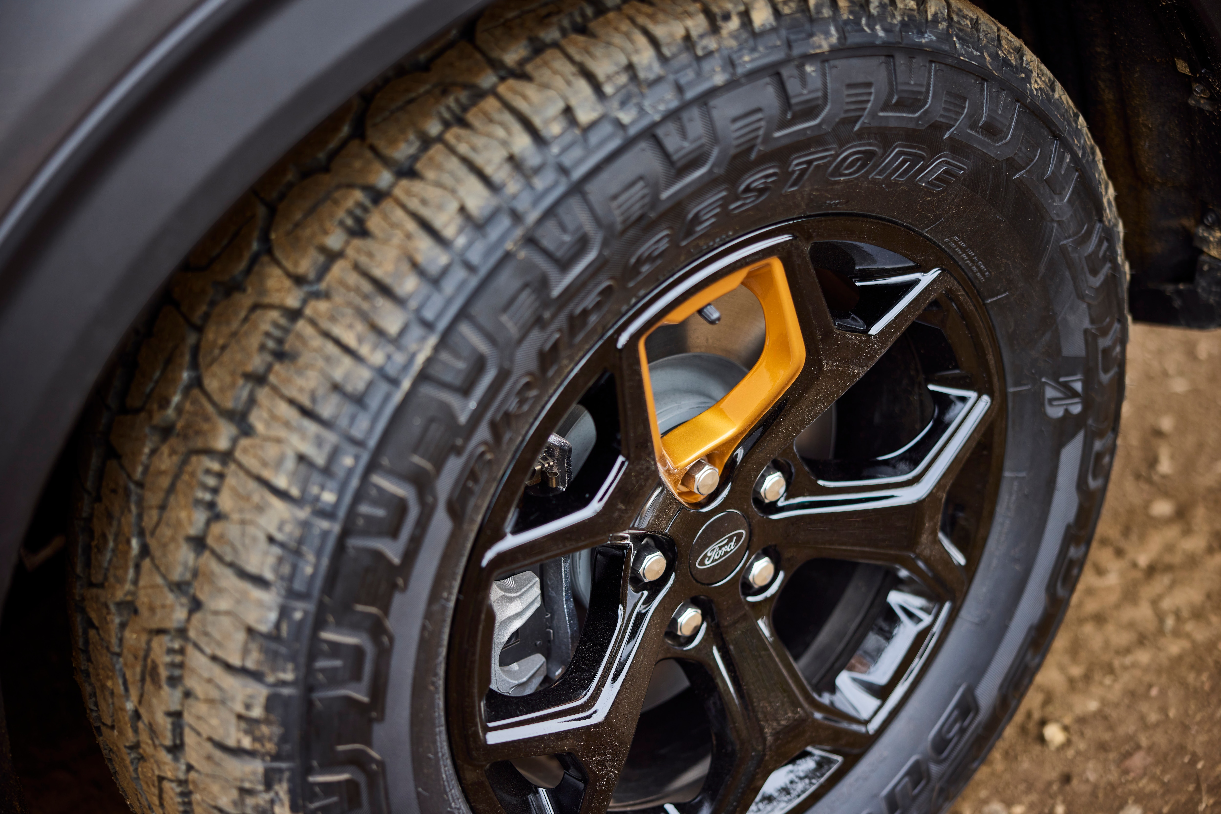 The Explorer Tremor's 18-inch wheels wrapped in all-terrain tires.